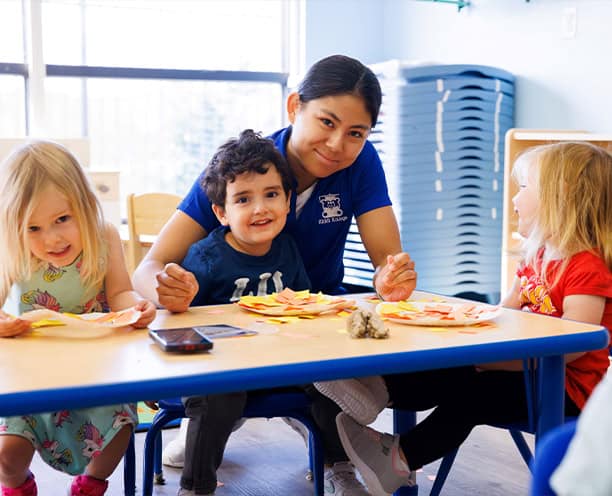 Teacher And Children Crafting Pre School Activity